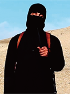 邦人の殺害を予告するISILの戦闘員（写真提供：共同通信社動画投稿サイト「ユーチューブ」より）