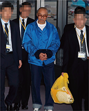 逮捕された城﨑勉(Rex Features/アフロ)